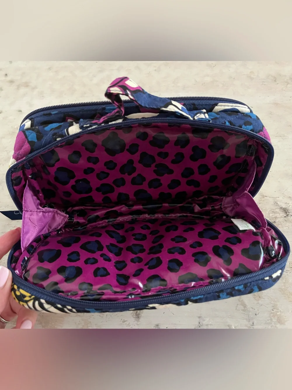 Vera Bradley quilted cosmetic pouch features the retired African Violet floral